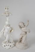 A Stephenson & Hancock white glazed porcelain candlestick, modelled as a young boy & beehive by a