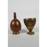 An Ottoman copper tombak rosewater sprinkler, with chased floral decoration and a brass and