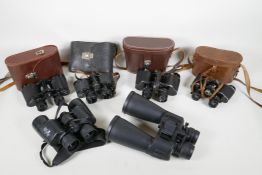 Six pairs of various binoculars, including a Maginon 10-30x60, Bushnell 8x42 WA, Noctovist MK11