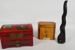 A carved hardwood pipe in the form of a cobra, 10" long, and a Chinese wooden tea caddy and