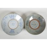 An oriental blue & white porcelain dish, and another, later painted mark to base, 10½" diameter