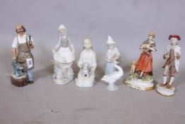 A Doulton figure, The Blacksmith, HN2782, a Lladro figure of a girl with a rabbit, another with a