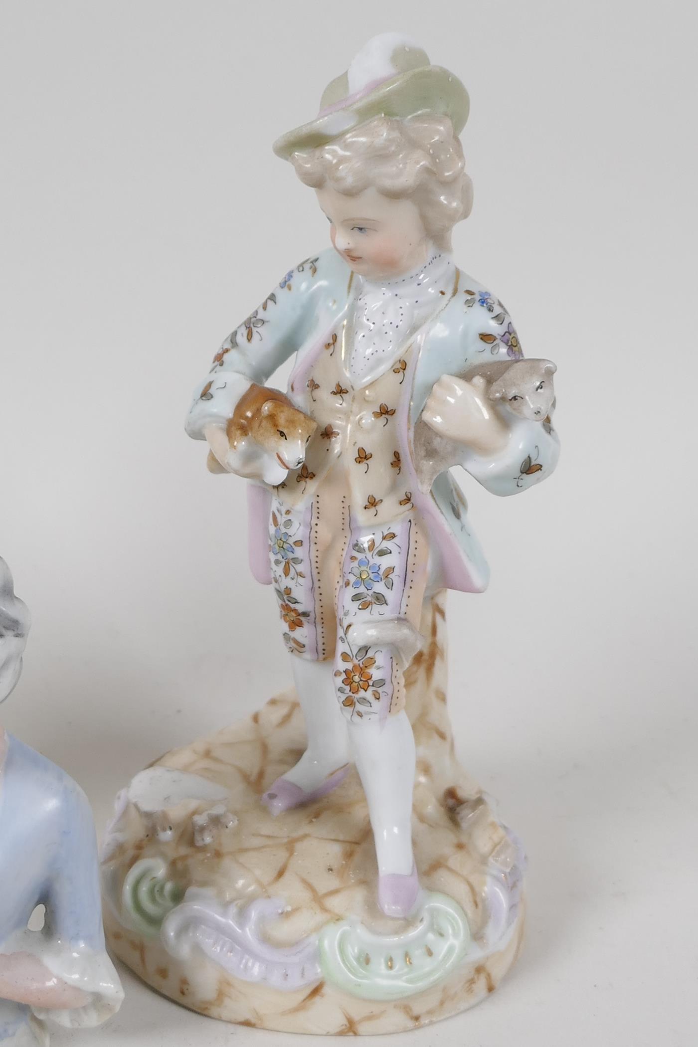 A Continental porcelain figurine of a Dandy holding two puppies, another of a corpulant man in a - Image 2 of 5