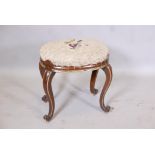 A rosewood and parcel gilt stool with lappeted frieze, raised on cabriole supports with scroll