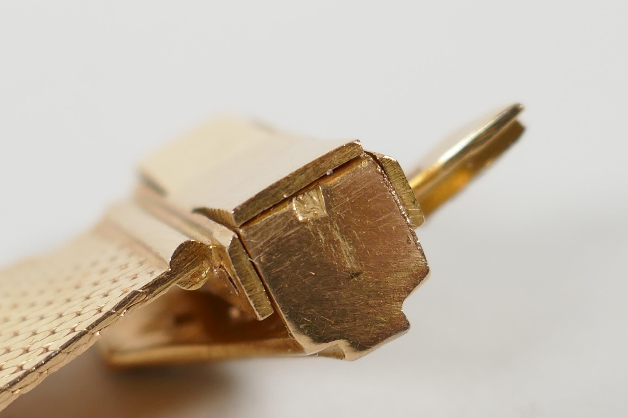 A lady's yellow metal adjustable bracelet, set with semi precious stones, stamped with a middle - Image 6 of 7