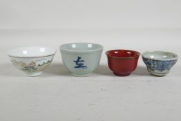 A Chinese flambe tea bowl, a Japanese blue and white porcelain tea bowl with character decoration, a