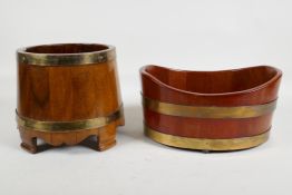 A coopered wood and brass bound barrel shaped planter, and another of oval form, largest 6½" high