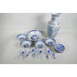 A Chinese blue and white service of serving bowl, four rice bowls, sauce dishes, spoons and rests,