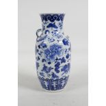 A C19th Chinese blue and white porcelain vase decorated with birds, chrysanthemums, prunus blossom