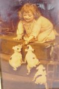 A Victorian chrystoleum depicting a young girl with three puppies, 6½" x 10"