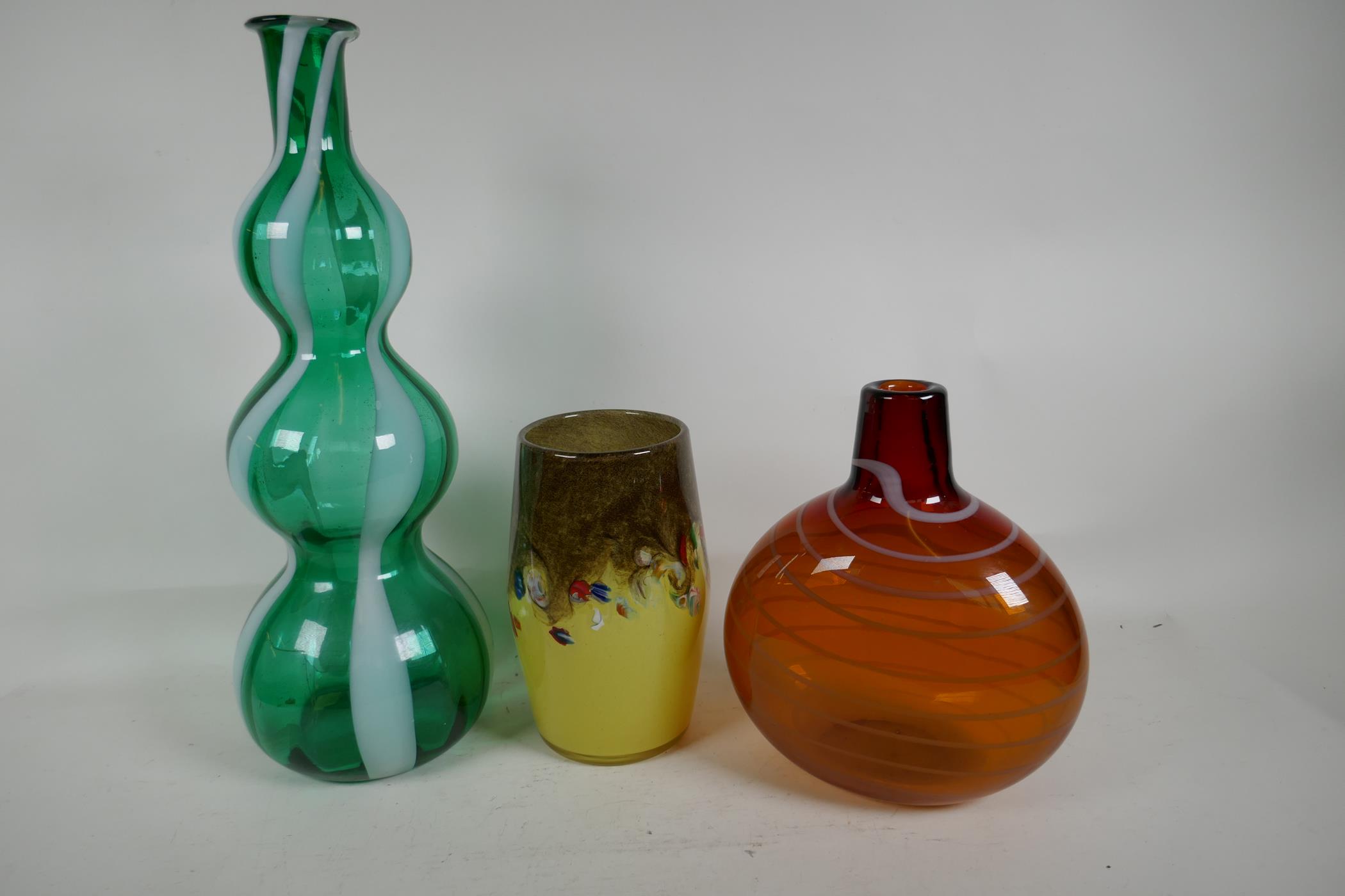 A Murano triple gourd green and white glass vase, 16" high, together with a Strathern studio glass