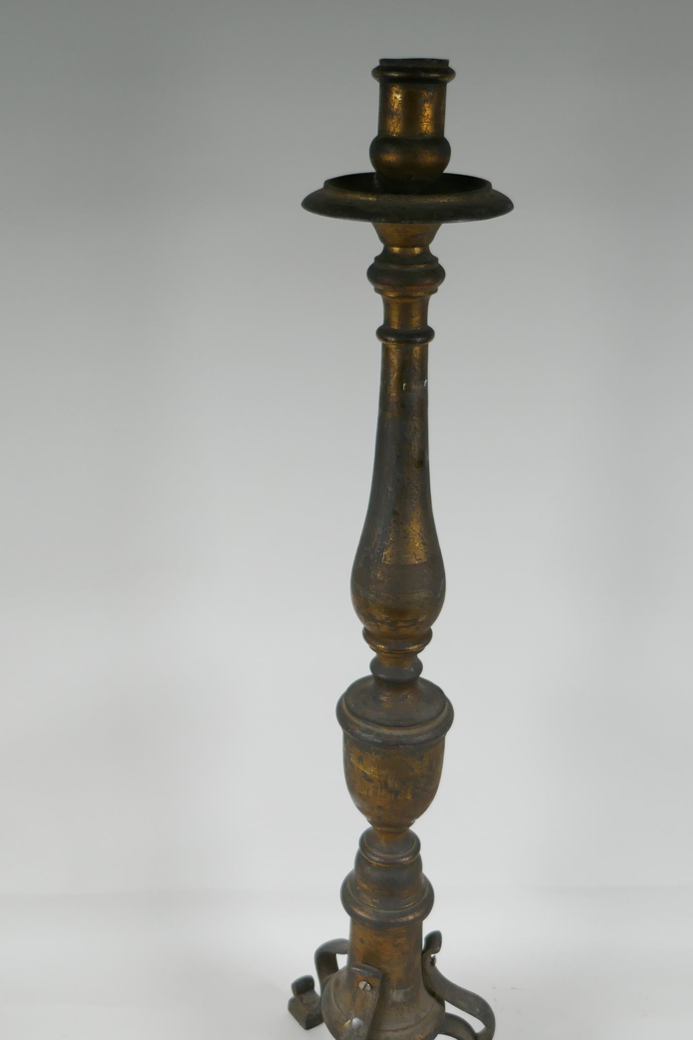 A turned bronze candlestick on a tripod base, 28" high - Image 3 of 3
