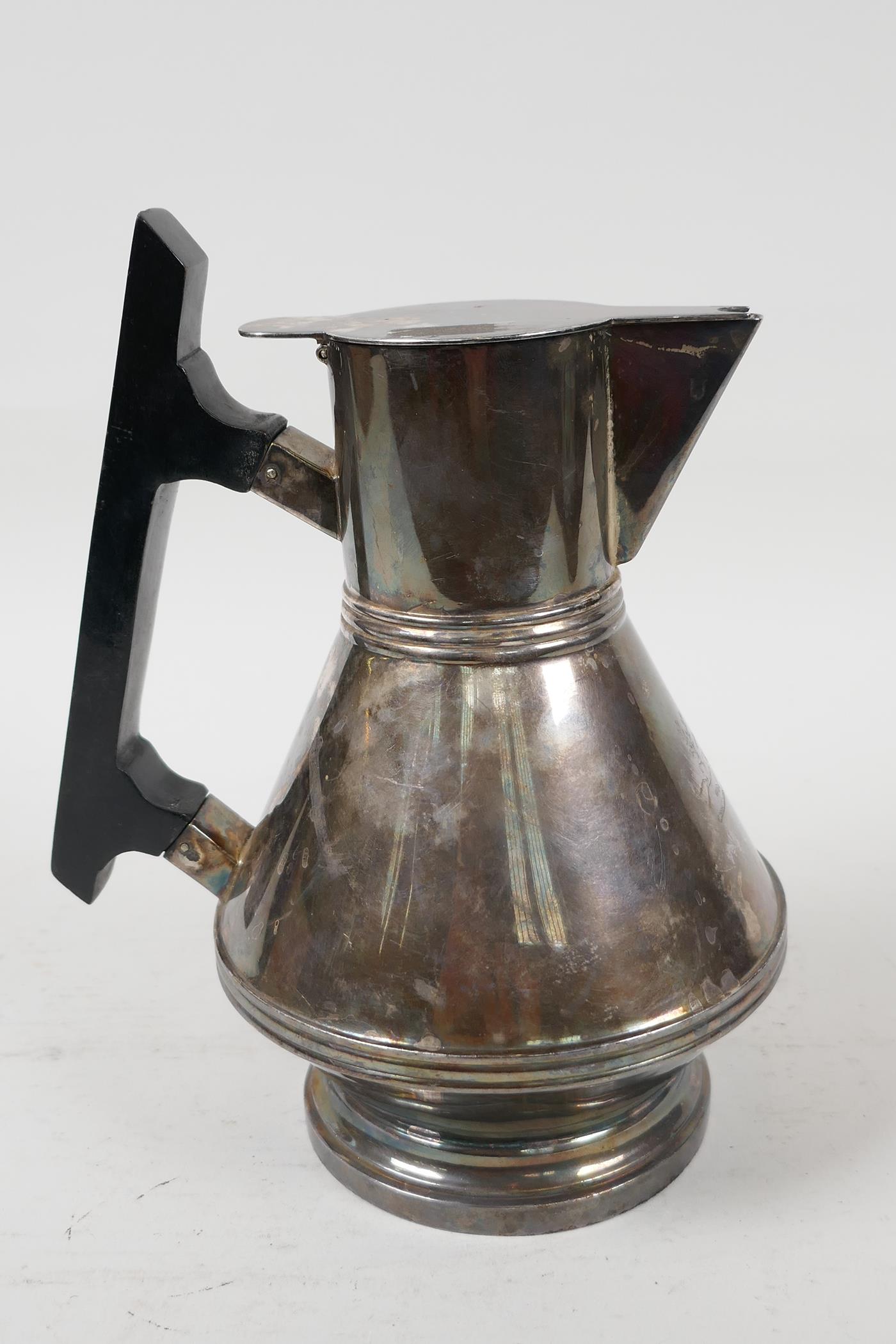 A late C19th Mappin & Webb Christopher Dresser design silver plated hot water jug with hardwood - Image 2 of 3