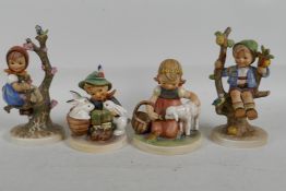 Four Goebels Hummel figures, largest 5" high