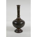 An Indo Persian bidriware vase with scrolling leaf decoration, 10" high