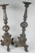 Two white metal candlesticks, A/F