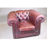 A button back leather Chesterfield style club chair