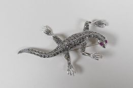 A 925 silver and marcasite brooch in the form of a lizard, 3" long