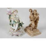 A C19th Chelsea porcelain figural candlestick  modelled as a boy with a corn sheaf, 8" high, A/F,