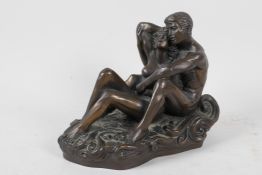 A bronzed composition figurine of a courting couple from Genesis Fine Art, 5½" high