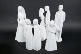 Five 'Moments by Coalport' figures, 'With this ring', 'The Bride', 'The Groom', 'Special Friends'