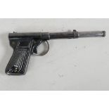 A vintage British made sheet steel push barrel air pistol, 177 caliber, 9" long