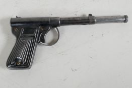 A vintage British made sheet steel push barrel air pistol, 177 caliber, 9" long