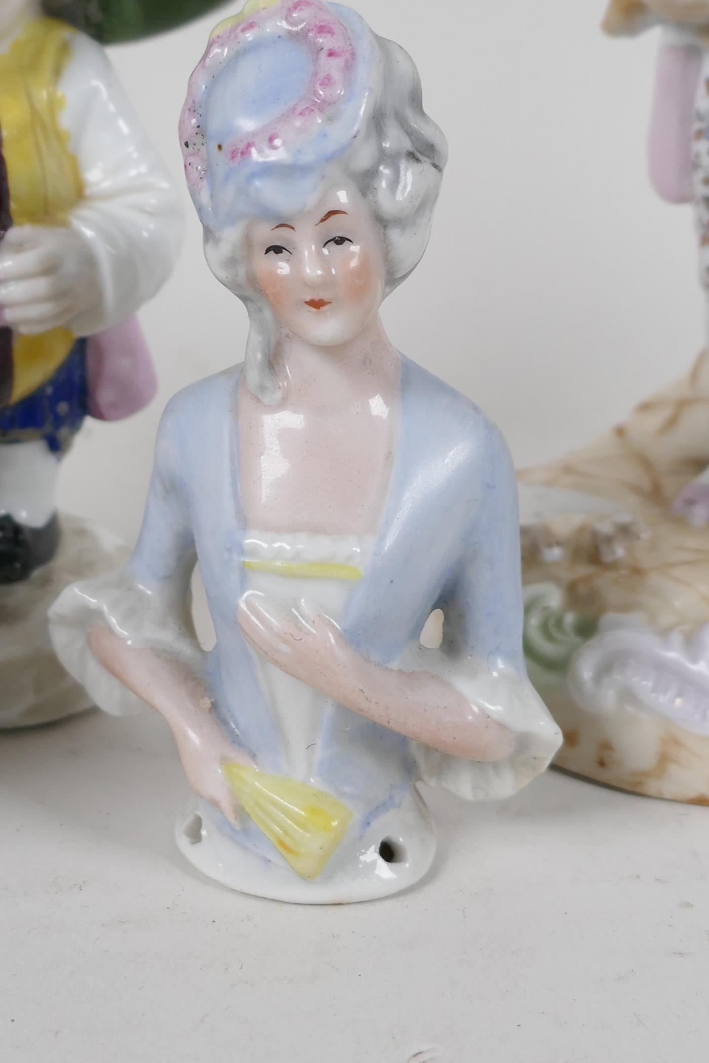 A Continental porcelain figurine of a Dandy holding two puppies, another of a corpulant man in a - Image 3 of 5