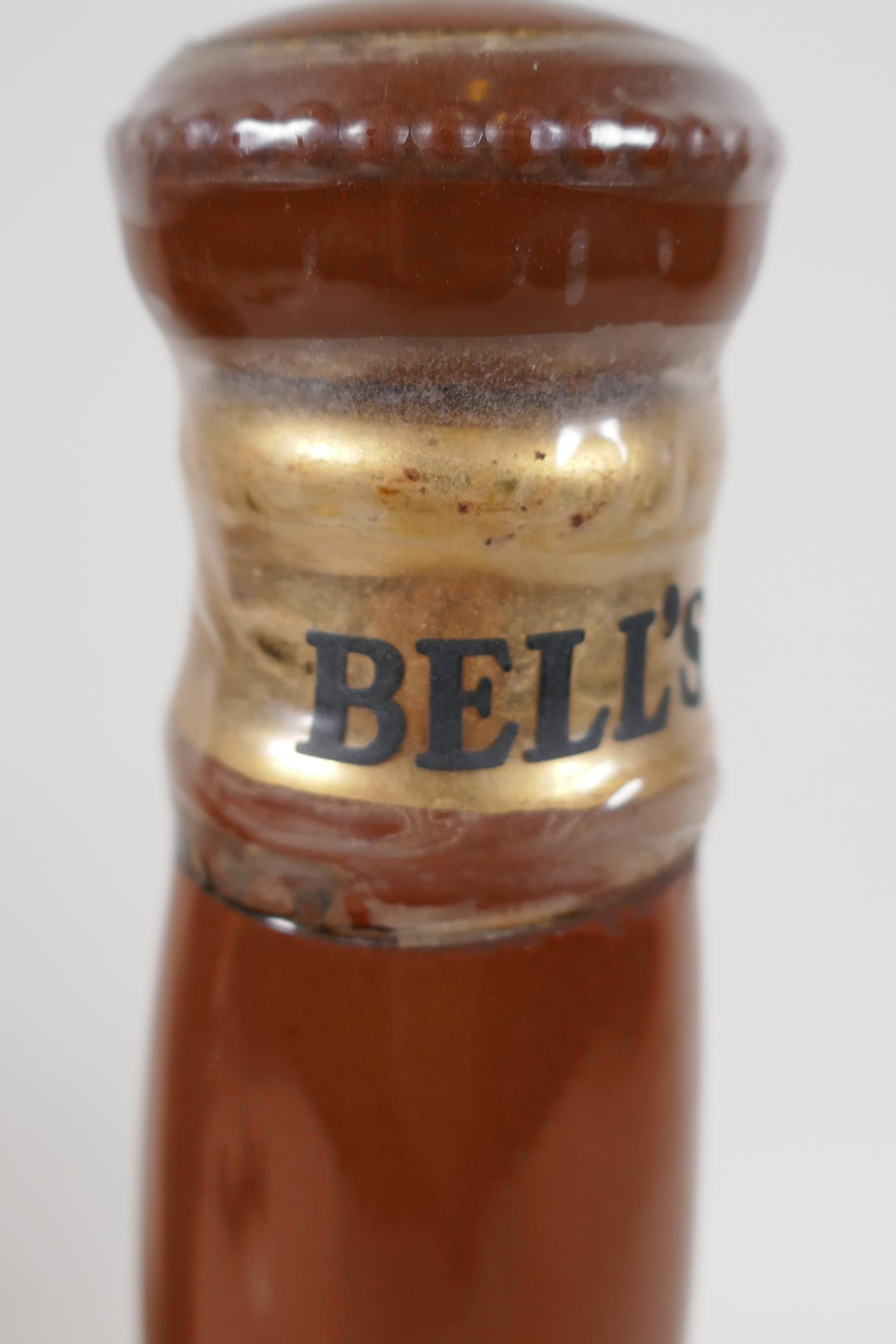 A sealed Wade Bells decanter, containing 75cms of Bell's Scotch Whisky 9½" high - Image 3 of 3