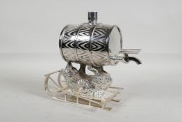 A silver plated brandy barrel held aloft by a bear on a sledge, 8" high