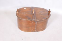 A C19th Continental varnished pine container with chipped and punched decoration, 23" x 15" x 12"