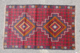 Full pile red ground Afghan Belouch nomadic rug, 35" x 56"