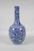 A Chinese Republic period, blue and white porcelain bottle vase with phoenix decoration, mark to