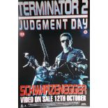 Eight vintage card backed film posters, including: 'Terminator 2 Judgement Day', 'Total Recall', '