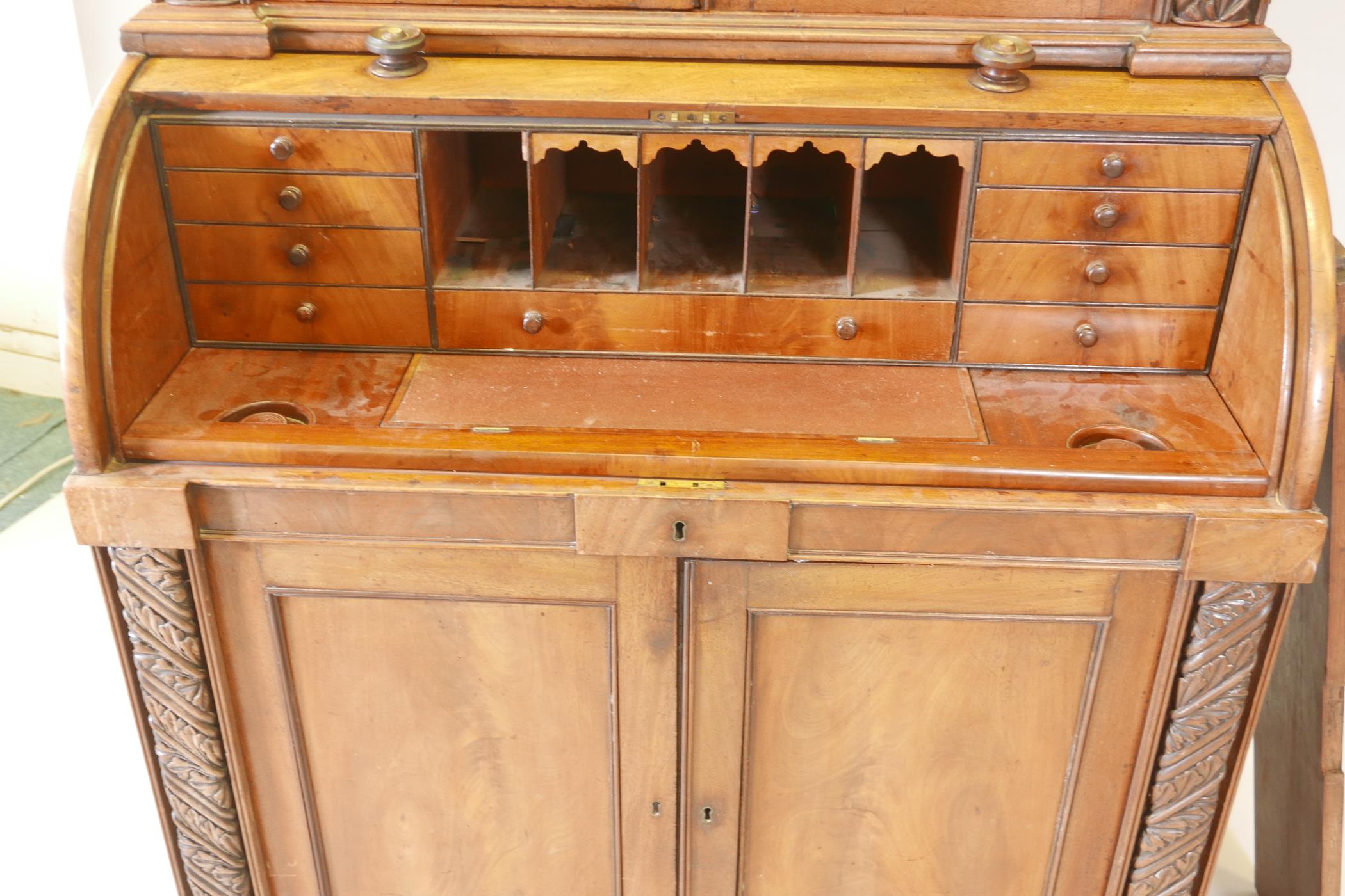 A Victorian cylinder top bureau bookcase, the upper section with two glazed doors and carved - Image 4 of 6