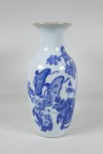 An early C20th Chinese blue & white porcelain vase, decorated with women, children and a kylin in