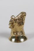 A gilt metal document seal, in the form of a horses head, 1½"