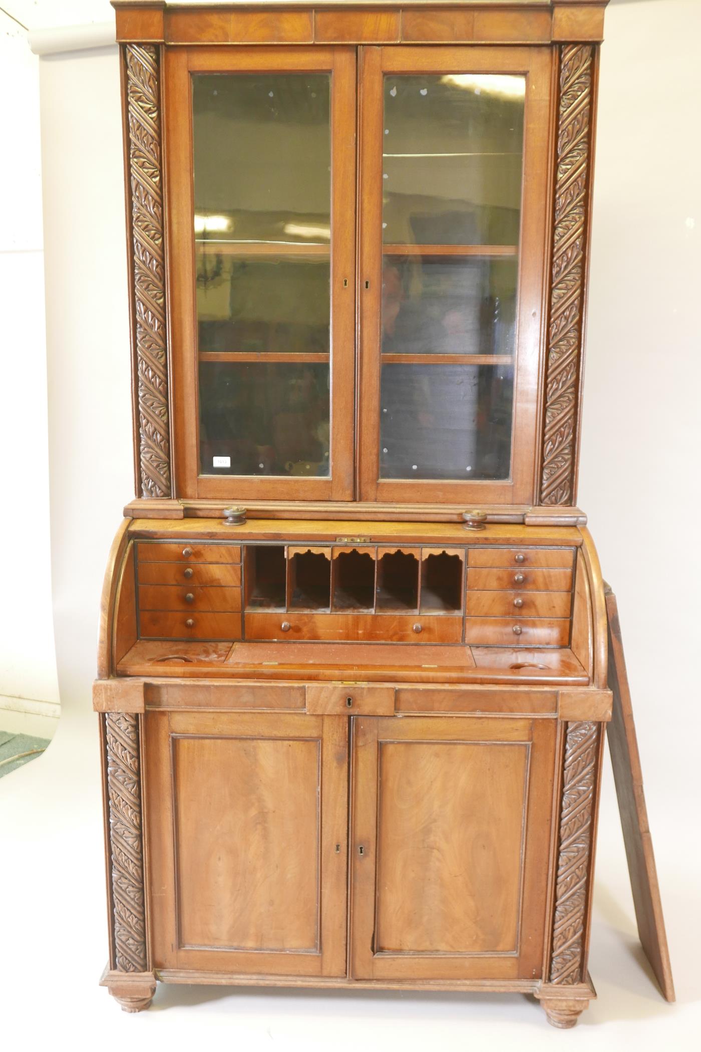 A Victorian cylinder top bureau bookcase, the upper section with two glazed doors and carved - Image 3 of 6