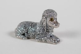 A miniature sterling silver figure of a toy poodle, 1" long