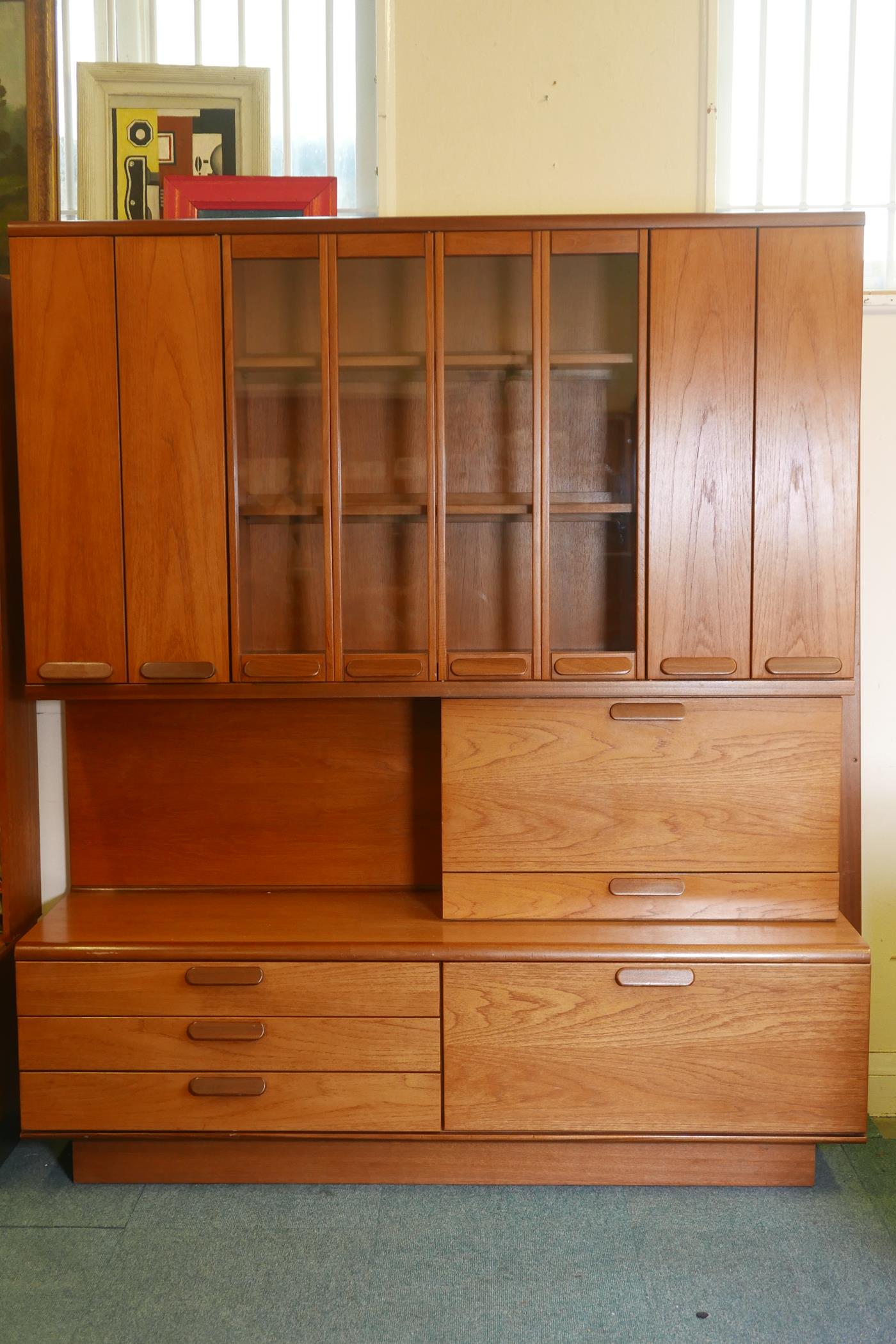 A White & Newton 'Chichester' teak high board, the upper section with bi-fold cupboard doors, and - Image 2 of 6