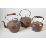 Three C19th copper kettles, largest 12" high