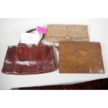 A snakeskin handbag, (film prop, "Miss Marple's" handbag), 14" wide, together with 2 other skin