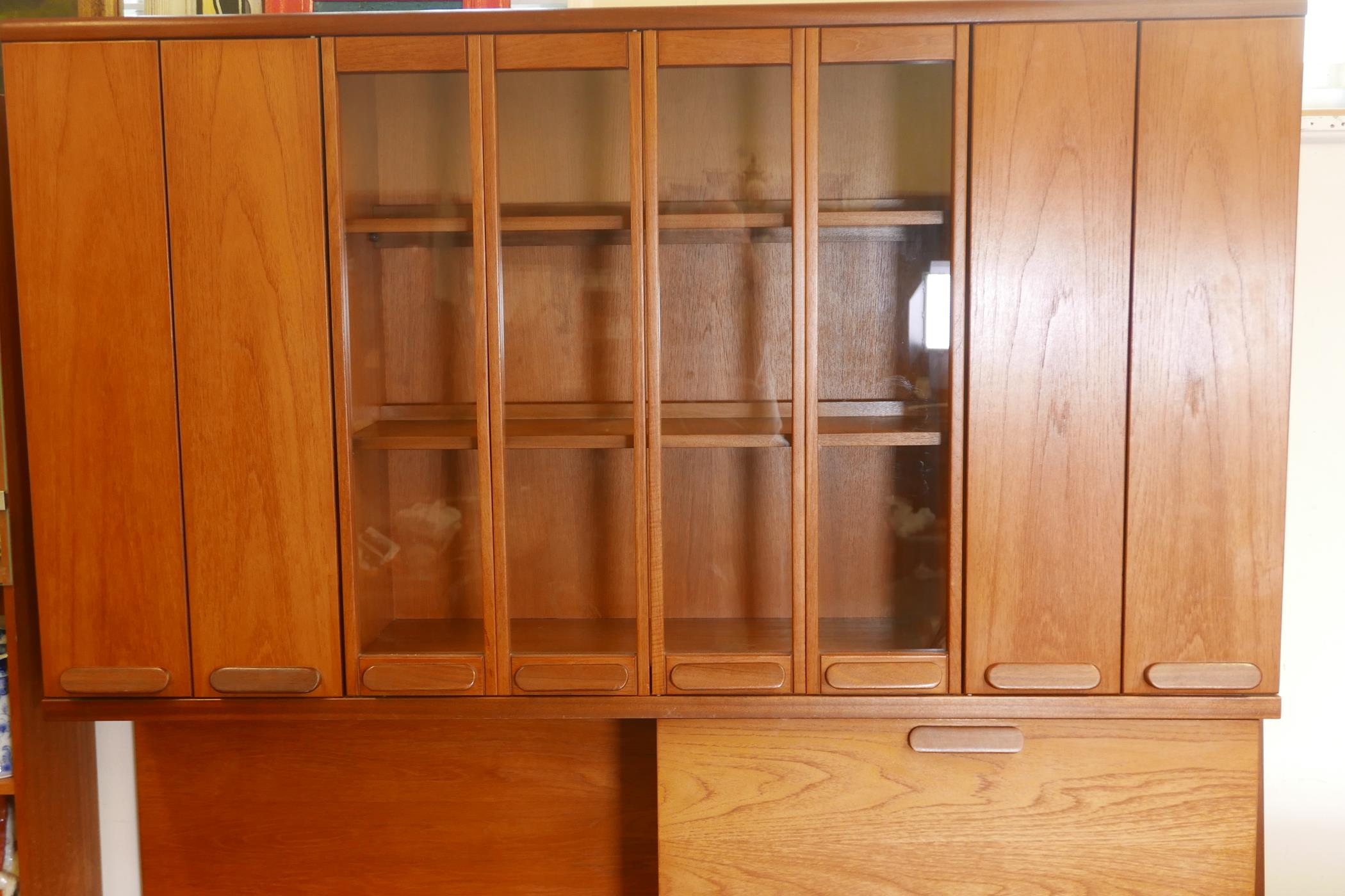 A White & Newton 'Chichester' teak high board, the upper section with bi-fold cupboard doors, and - Image 3 of 6