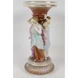 A continental porcelain stand, modelled as the three graces. 12" high