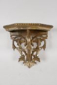 A C19th leaf carved, gilded, wood wall bracket, 8½" wide x 8½ long