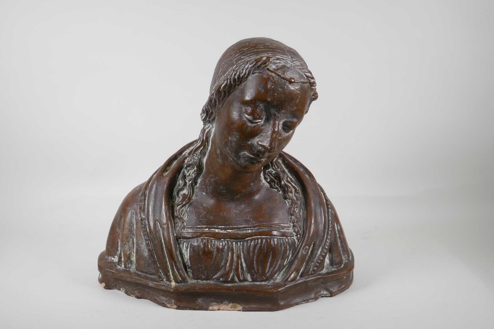 A glazed terracotta bust of a woman, 15" high