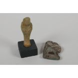 A Egyptian turquoise glazed Faience Shabti and a turquoise glazed pottery amulet of Khum, 3" high