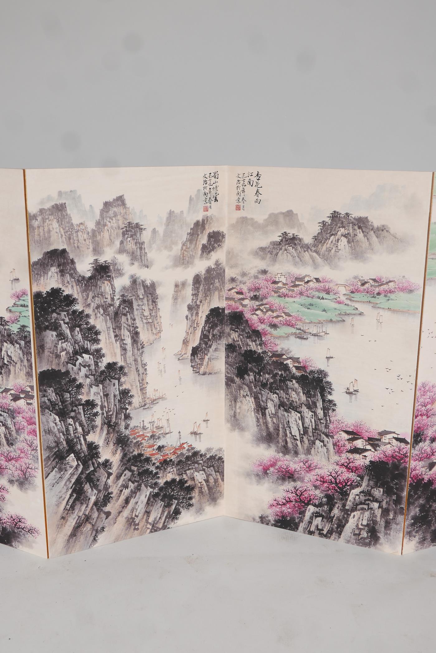 A Chinese concertina book, containing ten mountain and riverside landscapes, overpainted prints - Image 4 of 9