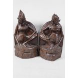 A pair of Balinese hardwood carvings of a young couple, 12" high