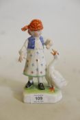 A Herend figure of a young girl & goose, 7" high